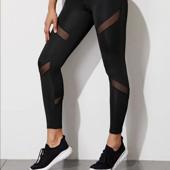 Black workout leggings with mesh cut out detail. - Picture 3 of 3